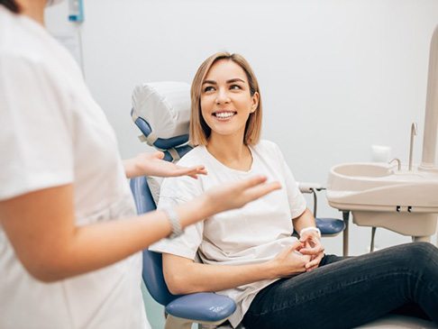 Lady shows off clear aligners?