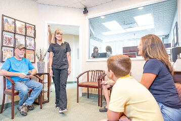 Dental office waiting room and staff